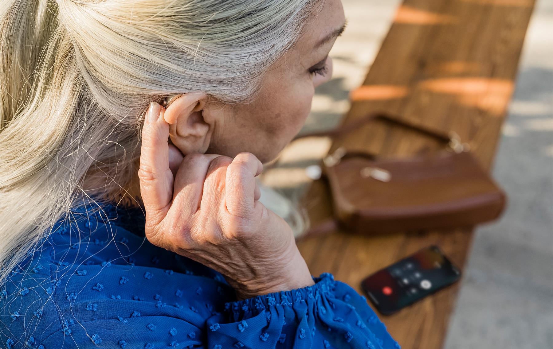 Beltone_Achieve_RIE_woman_closeup_outdoors