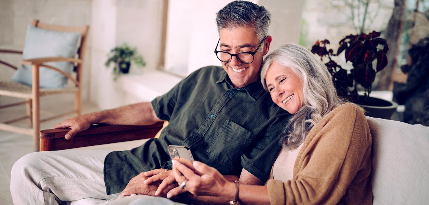 couple looking at mobile phone